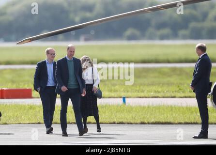 William & Kate Glasgow Airport. Kate boarded a private jet while William jumped on helicopter. Stock Photo