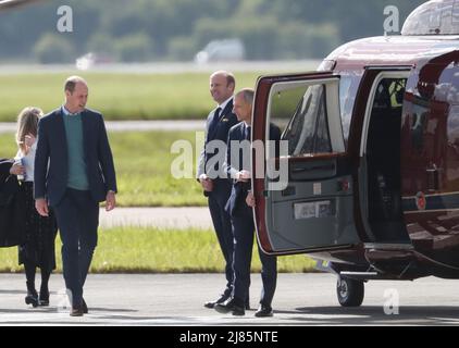 William & Kate Glasgow Airport. Kate boarded a private jet while William jumped on helicopter. Stock Photo