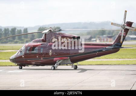 William & Kate Glasgow Airport. Kate boarded a private jet while William jumped on helicopter. Stock Photo