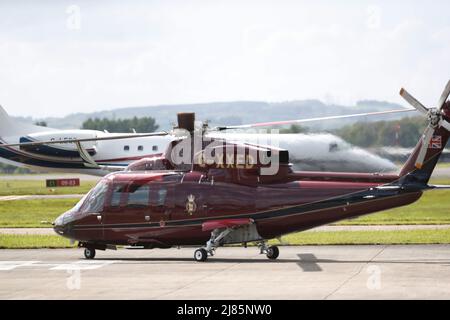 William & Kate Glasgow Airport. Kate boarded a private jet while William jumped on helicopter. Stock Photo