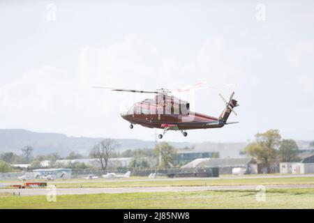 William & Kate Glasgow Airport. Kate boarded a private jet while William jumped on helicopter. Stock Photo