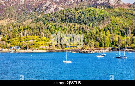 Picturesque Highland village of Plockton,The Jewel of the Highlands, sits on a sheltered bay with stunning views overlooking Loch Carron.  Scotland Stock Photo