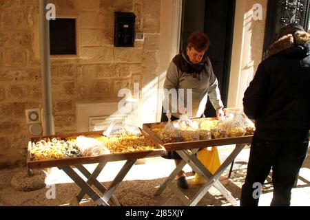 Bari, Italy. Fresh, home made pasta for sale by local people on Strada delle Orecchiette. Stock Photo