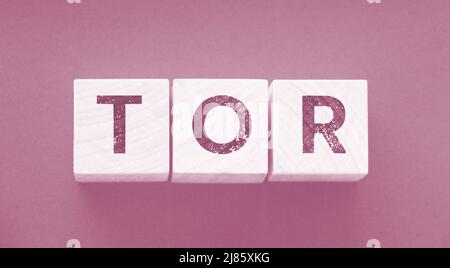 Tor anonymous by letters on a woden blocks on black. Business concept. Stock Photo