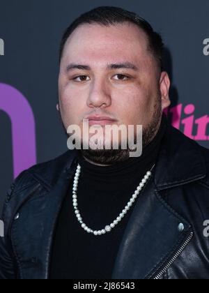 BEVERLY HILLS, LOS ANGELES, CALIFORNIA, USA - MAY 12: Koji arrives at the Rolling Stone And Meta Inaugural Creators Issue Celebration held at the Hearst Estate on May 12, 2022 in Beverly Hills, Los Angeles, California, United States. (Photo by Xavier Collin/Image Press Agency) Stock Photo