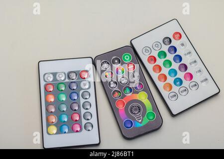 three different infrared remote controls for RGB LED-Lamps or strips with color changing capabilities Stock Photo