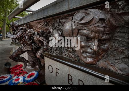 London England The Battle of Britain Monument May 2022 The Battle of Britain Monument in London is a sculpture on the Victoria Embankment, overlooking the River Thames, which commemorates the individuals who took part in the Battle of Britain during the Second World War. It was unveiled on 18 September 2005, the 65th anniversary of the Battle. The monument was conceived by Bill Bond, founder of the Battle of Britain Historical Society. The sculptor of the monument is Paul Day.[5] The statue was cast by Morris Singer, which is the oldest established fine art foundry in the world and has cast ma Stock Photo