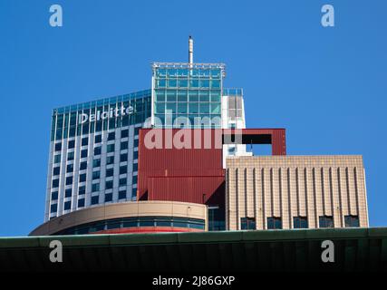 Rotterdam, Netherlands - April 28, 2022: Office buildings and skyscrapers of Deloitte and othe companies in Rotterdam Stock Photo