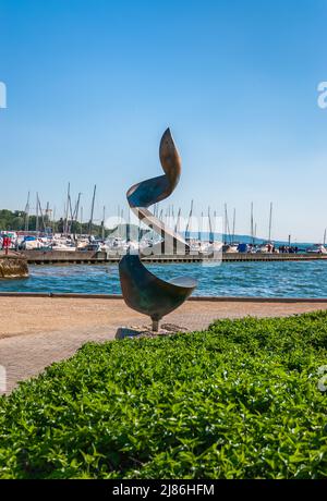 Biel, Switzerland - Mai 11, 2022: Abstract sculpture on the shores of Lake Bielersee in Switzerland Stock Photo