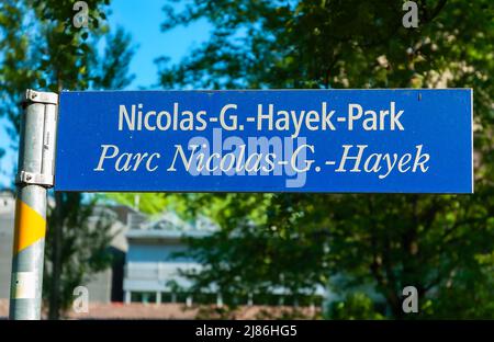 Biel, Switzerland - Mai 11, 2022: A street sign for Nicolas G. Hayek Park in Biel Stock Photo