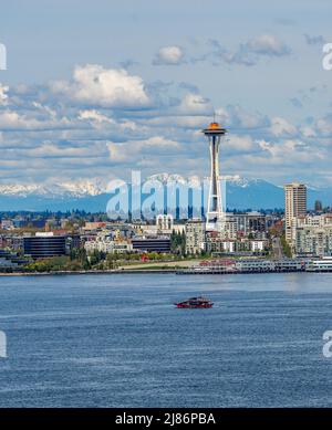 Cascade Mountain can be seen behind the Seattle skyline in Washington State. Stock Photo