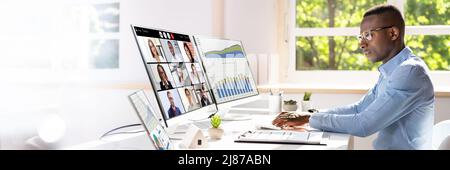 Online Virtual Learning Conference Meeting On Computer Stock Photo