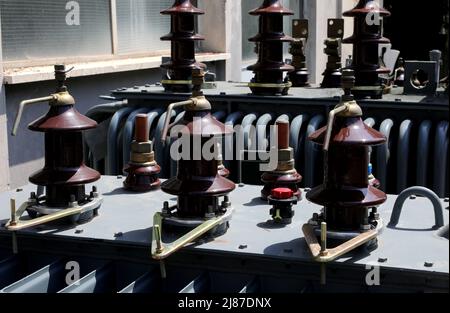 obsolete high voltage current transformer in the warehouse of the electrical industrial equipment Stock Photo