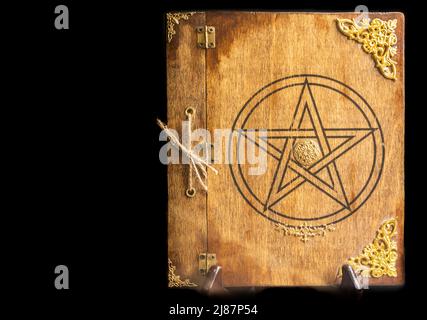 Old book of black magic. Concept for mystery, fantasy, dark evil Stock Photo