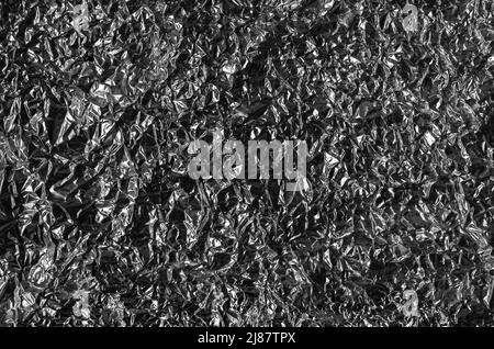 Abstract texture pattern metallic paper using as a background or wallpaper. Metal aluminum foil shiny and reflector. High quality photo Stock Photo