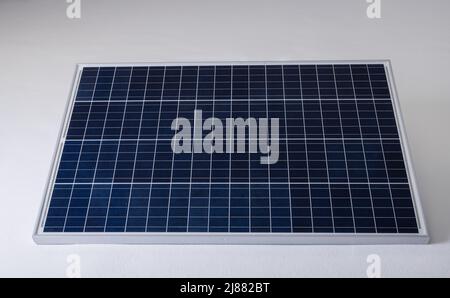High angle view of solar panel isolated against white background, copy space Stock Photo
