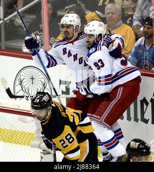 Pittsburgh, USA. 13th May, 2022. New York Rangers left wing Chris Kreider (20) celebrates his goal with New York Rangers center Mika Zibanejad (93) during the second period in game six of the first round of the Stanley Cups Playoffs at PPG Paints Arena in Pittsburgh on Friday, May 13, 2022. Photo by Archie Carpenter/UPI Credit: UPI/Alamy Live News Stock Photo