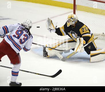 Pittsburgh, USA. 13th May, 2022. New York Rangers center Mika Zibanejad (93) watches New York Rangers left wing Chris Kreider (20) score his goal with during the second period in game six of the first round of the Stanley Cups Playoffs at PPG Paints Arena in Pittsburgh on Friday, May 13, 2022. Photo by Archie Carpenter/UPI Credit: UPI/Alamy Live News Stock Photo