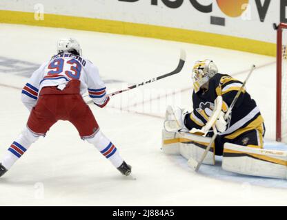 Pittsburgh, USA. 13th May, 2022. New York Rangers center Mika Zibanejad (93) shot hits the corner of the goal during the second period of the Rangers 5-3 win of game six in the first round of the Stanley Cups Playoffs at PPG Paints Arena in Pittsburgh on Friday, May 13, 2022. Rangers win ties the series at three games all. Photo by Archie Carpenter/UPI Credit: UPI/Alamy Live News Stock Photo