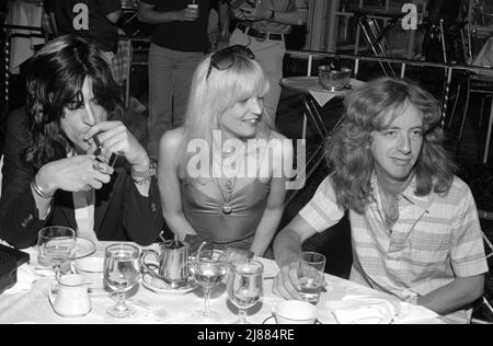 Joe Perry, Elyssa Jerret and Brad Whitford  at the press conference before the premiere of Sgt. Pepper's Club Band at the Beverly Wilshire Hotel in Beverly Hills, California on July 16, 1978 Credit: Ralph Dominguez/MediaPunch Stock Photo