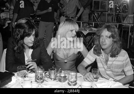 Joe Perry, Elyssa Jerret and Brad Whitford  at the press conference before the premiere of Sgt. Pepper's Club Band at the Beverly Wilshire Hotel in Beverly Hills, California on July 16, 1978 Credit: Ralph Dominguez/MediaPunch Stock Photo