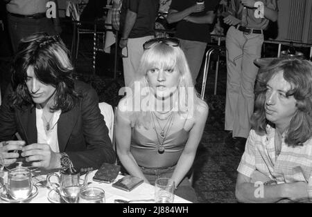 Joe Perry, Elyssa Jerret and Brad Whitford  at the press conference before the premiere of Sgt. Pepper's Club Band at the Beverly Wilshire Hotel in Beverly Hills, California on July 16, 1978 Credit: Ralph Dominguez/MediaPunch Stock Photo