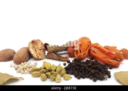 Different mix of aromatic spices isolated in white background. Composition with copy space. Stock Photo