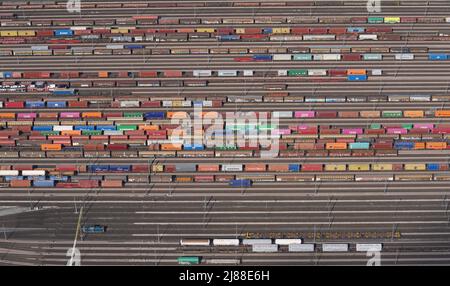 11 May 2022, Lower Saxony, Seevetal: Freight trains stand at the Maschen marshalling yard. The marshalling yard south of Hamburg is the largest marshalling yard in Europe. Photo: Marcus Brandt/dpa Stock Photo