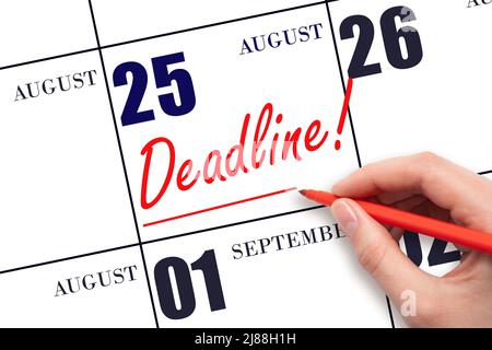 25th day of August. Hand drawing red line and writing the text Deadline on calendar date August 25. Deadline word written on calendar Summer month, da Stock Photo