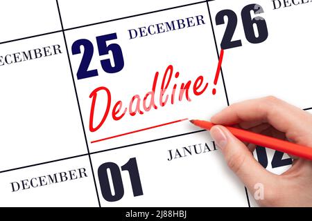 25th day of December. Hand drawing red line and writing the text Deadline on calendar date December 25. Deadline word written on calendar Winter month Stock Photo