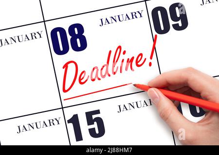 8th day of January. Hand drawing red line and writing the text Deadline on calendar date January 8. Deadline word written on calendar Winter month, da Stock Photo