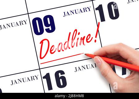 9th day of January. Hand drawing red line and writing the text Deadline on calendar date January 9. Deadline word written on calendar Winter month, da Stock Photo