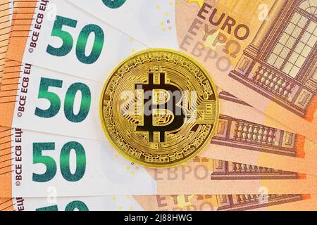 Bitcoin and Euro Notes, Close Up Stock Photo