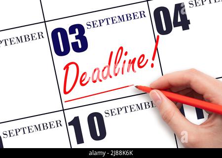 3rd day of September. Hand drawing red line and writing the text Deadline on calendar date September  3. Deadline word written on calendar Autumn mont Stock Photo