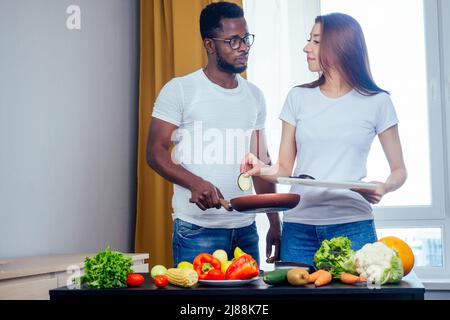 Young African American Cooker Woman Wearing Uniform Holding Waiter Tray  Stock Photo by ©Krakenimages.com 381342402