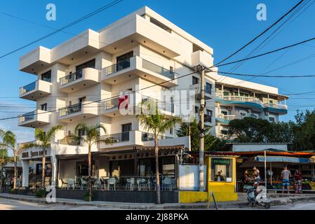 Ksamil, Albania - September 9, 2021: View of the typical residential building with rooms for rent in Ksamil, Albania. Traveling concept background. Stock Photo