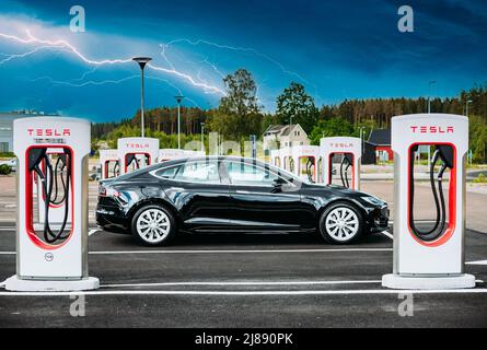 Black Color Tesla Model S 100d Car Parked At Charging Station. The ...