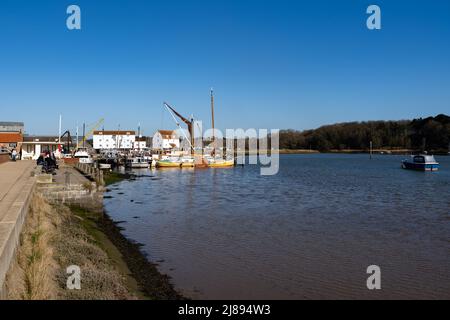 Woodbridge Suffolk UK March 18 2022: Looking downstream on the banks of the River Deben to the Tide Mill in Woodbridge Stock Photo