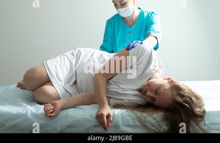 Doctor process epidural nerve block for pregnant woman Stock Photo