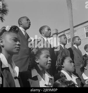 [Untitled photo, possibly related to: Daytona Beach, Florida. Bethune-Cookman College. Student choir singing on the campus]. Stock Photo