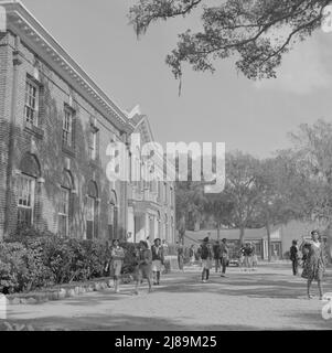 [Untitled photo, possibly related to: Daytona Beach, Florida. Bethune-Cookman College. Students leaving the White Hall building]. Stock Photo