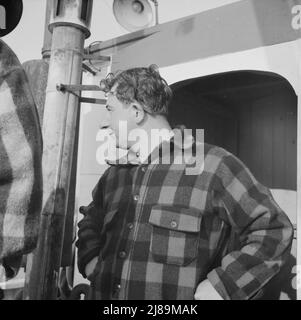 On board the fishing boat Alden out of Gloucester, Massachusetts. Pasquale Maniscaleo, engineer. Stock Photo