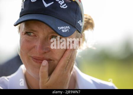 BANG KAPONG THAILAND - May 14:  Manon De Roey of Belgium with wet eyes after winning the Aramco Team Series (individual) at Thai Country Club on May 14, 2022 in Bang Kapong, Thailand (Photo by Orange Pictures) Stock Photo