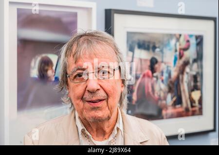 London, UK. 14th May, 2022. Bill Wyman, ex Rolling Stone, launches his photo book From The Inside and poses with some of his photos in the Iconic Gallery - Photo London returns to Somerset House. Credit: Guy Bell/Alamy Live News Stock Photo