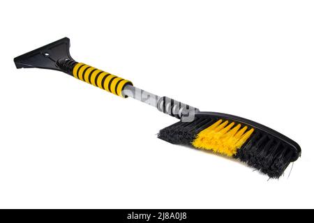 Winter car brush for removing snow plastic scrapper isolated on the white Stock Photo