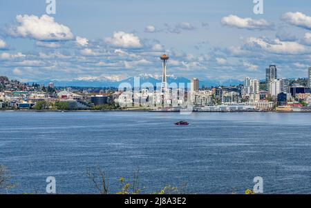 Cascade Mountain can be seen behind the Seattle skyline in Washington State. Stock Photo