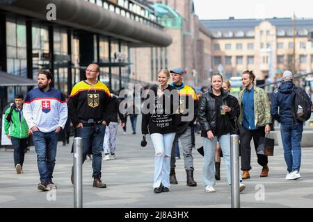 Helsinki, Finland. 14th May, 2022. Fans of the German and Slovakian national ice hockey teams seen walking in Helsinki city center. On May 13, the Ice Hockey World Championship 2022 began in Finland. Hockey fans from many countries arrived in Helsinki and Tampere, the citys where the matches will take place. (Credit Image: © Takimoto Marina/SOPA Images via ZUMA Press Wire) Stock Photo