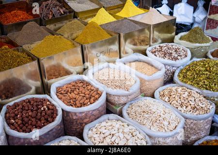 bags of nuts, spices and ingredients for sale on food market (Suq, Damascus) Stock Photo