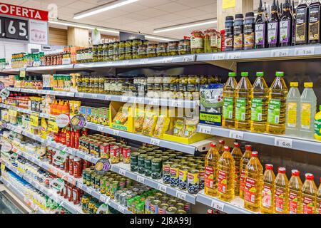 Huelva, Spain - May 10, 2022: Shelf of Sauces and condiments in a supermarket Stock Photo