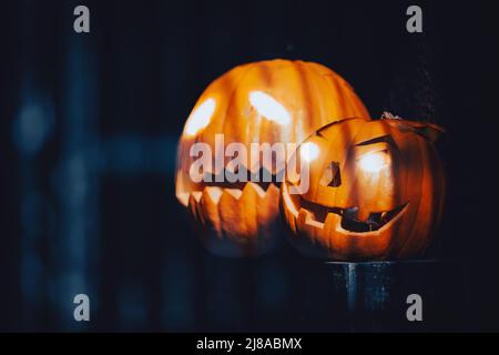 Two pumpkins carved for Halloween celebraiton in street of San Francisco, California, United States of America. Stock Photo